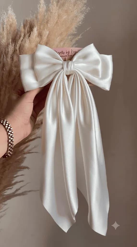 Satin bow hair clip with long tails, in ivory, antique gold and two shimmer finishes